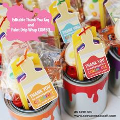 colorful paint can with thank you tags on them for kids's birthday party favors