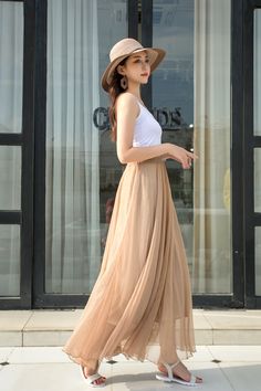 "DETAILS: * Chiffon Skirt * Chiffon Lining * No Pockets * around elastic waistband * Circle Skirt * Big swing skirt * Perfect for spring, summer and autumn * Machine Washable in Warm/Cold Water; Do not bleach / Mid-iron / Hang Dry * More colors *The model is 170 cm (5′7″) tall with a 80 cm (31.5\") bust, 66 cm (26\") waist. She is wearing the skirt in color khaki (No. 8) in one fit size with length 100 cm. * Choose CUSTOM Order if you Can't find your size in our size Chart Chang the Length Your Pleated Circle Skirt, Skirt Dance, Long Linen Skirt, Long Chiffon Skirt, Skirt Chiffon, Chiffon White Dress, Handmade Skirts, Long Skirts For Women, Wool Clothing