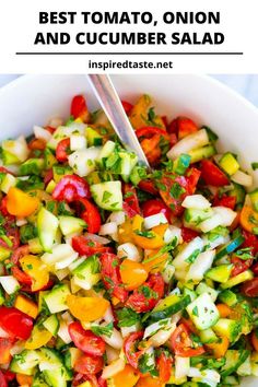 a white bowl filled with cucumber salad on top of a table