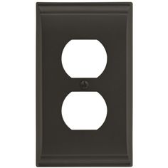 a black outlet cover with two holes on the front and one hole in the back