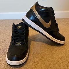 Brand New, Without Box, Nice Shoes, Received A Pair Similar To These For Christmas So Don't Need Them. Has Minor Signs Of Wear On White Sole, Shown In Photos, Just Need To Be Wiped, From Being Stored With Other Shoes Nike Gold Sneakers For Streetwear, Nike Black Sneakers With Perforations, Black And Gold Air Force 1, Nike Shoes Women Black And Gold, Black Nike Sneakers With Perforations, Black Synthetic Skate Shoes, Nike Gold, Black Metallic, Womens Shoes Sneakers