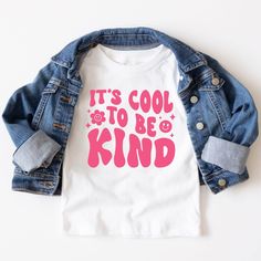 a t - shirt that says it's cool to be kind