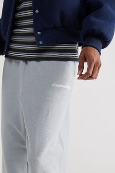 Classic sweatpants by Standard Cloth in a brushed cotton construction. Relaxed silhouette fitted with pockets and topped with logo text. Stretch elastic waistband with an adjustable tie closure. Urban Outfitters exclusive. Features Essential sweatpants from Standard Cloth Logo text embroidery Elastic waistband & adjustable drawstring tie UO exclusive Content + Care 100% Cotton Machine wash Imported Size + Fit Model in Black is 6’2.5" and wearing size Medium Measurements taken from size Medium Ri Cloth Logo, Essential Sweatpants, Text Embroidery, Logo Text, Ankle Cuffs, Brushed Cotton, Light Grey, Urban Outfitters, Fitness Models