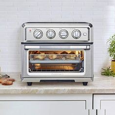 a toaster oven with food cooking in it