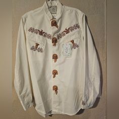 New With Tags Men's Western Lon Sleeve Shirt Men's Size Small Color Ivory!! Traditional Cotton Shirt With Button Closure, Traditional White Button-up Tops, White Cotton Embroidered Camp Shirt, Traditional White Button-up Shirt, White Embroidered Cotton Camp Shirt, Vintage Long Sleeve Shirt For Western-themed Events, White Long Sleeve Camp Shirt With Button Closure, Cream Western Shirt Mens, Vintage Button-up Shirt For Rodeo