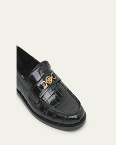 Versace loafers in crocodileprinted calf leather     Stacked heel    Round moc toe    Medusa coin bit hardware    Lightweight, sturdy TPU outsole    Lining: Polyester    Slipon style    Made in Italy Luxury Crocodile Pattern Loafers For Workwear, Luxury Crocodile Pattern Loafers For Work, Classic Crocodile Pattern Loafers For Office, Classic Crocodile Pattern Loafers For Business, Versace Loafers, Versace Heels, Versace Gold, Bit Loafers, Versace Men