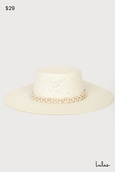 Enjoy the view of the ocean waves with the Lulus Beach Daze Cream Beaded Boater Hat! This cute sun hat is composed of lightweight, woven straw that shapes a boater silhouette with a high crown, flat top, and a wide floppy brim. Smooth wood-look beads accent the band for a vacay feel! 4" soft brim. 23" interior circumference with an internal drawstring. Crown measures 4" tall. 100% Paper. Gentle Wash. Hang Dry. Imported. Lulus | Beach Daze Cream Beaded Boater Hat. White Toquilla Straw Hat Band For Beach, Elegant Vacation Straw Hat Made Of Paper Straw, Elegant Paper Straw Hat For Vacation, Braided Straw Boater Hat With Flat Brim, Elegant Braided Straw Hat For Beach, White Straw Hat For Spring With Flat Crown, White Flat Crown Sun Hat For Spring, Beachy Straw Boater Hat With Flat Brim, Beach Season Short Brim Boater Hat