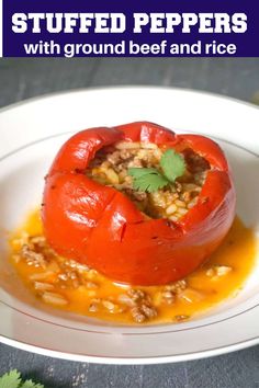 stuffed peppers with ground beef and rice in a white bowl on a gray tablecloth