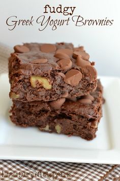 two chocolate brownies stacked on top of each other