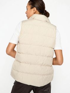 Everyone needs a chic little puffer vest, and our Anders Vest is our modern take on this forever classic. It includes those special Brochu Walker touches like a high stand collar and grosgrain detailing on the hidden snap closure. Lightweight and down-filled, it features side seam pockets for added functionality and a slightly curved back hem that makes it always feminine and the perfect layer. Runs true to size Tailored fit High stand collar Snap hidden front closure with grosgrain detail Side Brochu Walker, Beauty Gift Card, Mens Vests, Curved Back, Down Vest, Puffer Vest, Denim Pants, Stand Collar, Snap Closure