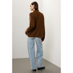 Brown knit (38% Viscose, 35% Recycled Nylon, 22% Extrafine Merino Wool, 5% Alpaca). Sweater. Long sleeves. Mock neck. Pull on. 23" from shoulder to hemline. Imported. Brown Knit Top For Layering, Trendy Brown Knit Top For Layering, Brown Casual Turtleneck For Layering, Casual Brown Turtleneck For Layering, Brown Soft Knit Top For Layering, Spring Fine Knit Brown Top, Brown Knit Top For Spring Layering, Oversized Brown Turtleneck, Versatile Fine Knit Top For Fall