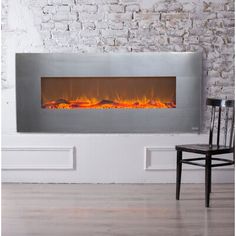 a modern fireplace with bright flames in an empty room