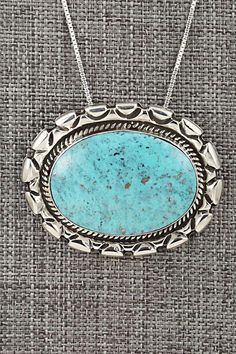 This turquoise and sterling silver necklace was made by Navajo silversmith Jimson Belin. The back is stamped .925.Necklace: 18"Pendant Length: 1 1/4"Pendant Width: 1 5/8"Free shipping on all orders! We ship with USPS and always include tracking. All orders ship within a day of payment.Returns are accepted up to 30 days after you receive your order. Just send us a message. Our shop offers cash back or store credit. The item must be returned in new condition. Sterling Silver Necklace, Turquoise Sterling Silver, Sterling Silver Necklaces, Silver Necklace, Stamp, Turquoise, Sterling Silver, Pendant, Free Shipping