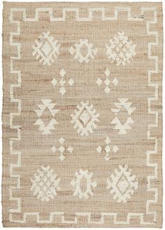 a beige and white rug with geometric designs