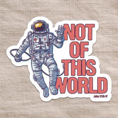 an astronaut sticker that says not of this world