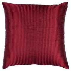 a red velvet pillow with pleated fabric on the front and back, it has a square