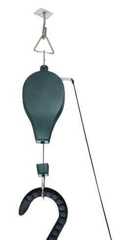 a green umbrella with a black handle attached to it and a metal hook hanging from the side