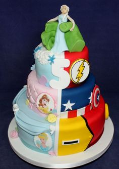 a multi layer cake decorated with cartoon characters