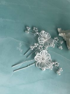 Beautiful white lace flower with a pearl in the center bridal silver hair pin.  Set of 2 Flower Bride, Silver Hair Pin, Pearl Bride, Hair Accessories Pearl, Pin Hair, Bridal Flower, Lace Hair, Flower Lace, Lace Flower