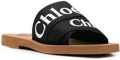 Imagine slipping into a pair of sandals that perfectly blend style and comfort, like the chloé woody flat sandals. They're as easygoing as a Sunday afternoon coffee with friends. Plus, they make any outfit look effortlessly chic. Color: BLACK (WOODY001) Composition: Lining: Rubber 100%, Polyamide 100%, Sole: Rubber 100%, Outer: Polyamide 100% Season: SS24 Made in: VIETNAM | Chloé Women's Woody Flat Sandals in Black | Size IT 35 | CHC22U188Z3WOODY001 Chloe Flats, Afternoon Coffee, Coffee With Friends, Flat Mules, Prada Designer, Sunday Afternoon, Black Leather Sandals, Toe Designs, Black Flats