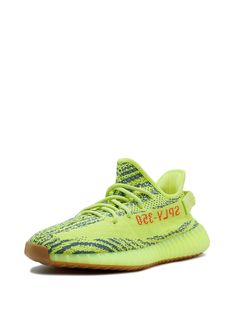 Find YEEZY Boost 350 V2 Semi Frozen Sneakers on Editorialist. neon green YEEZY Primeknit upper text print abstract pattern print round toe front lace-up fastening pull-tab at the heel branded insole signature cushioned Boost midsole rubber sole These styles are supplied by a premium sneaker marketplace. Stocking only the most sought-after footwear, they source and curate some of the most hard to find sneakers from around the world. Green Low-top Sneakers With Graphic Print, Green Graphic Print Sports Sneakers, Yellow Logo Print Sneakers For Streetwear, Trendy Neon Yellow Sneakers For Streetwear, Yeezy 750, Sply 350, Ethical Brands, Text Print, Yeezy Boost 350 V2