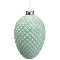 a green glass ball ornament hanging from a cord