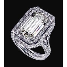 an emerald cut diamond ring set in white gold