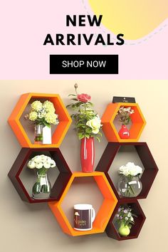 the shelves have flowers in them and vases on them with text that reads new arrivals shop now