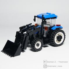 there is a lego tractor that has been built in the shape of a bulldozer