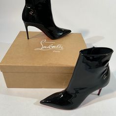 Brand New, Never Worn Authentic Christian Louboutin Sporty Kate Ankle Boots In A Black Patent Leather Finish. In Perfect Condition, Only Ever Tried On On Carpet. Super Sexy And Sleek With An 85mm Heel Height You Could Wear For Hours. Size 36. Luxury Patent Leather Heeled Boots For Evening, Luxury Ankle Boots With 4-inch Heel, Luxury High Heel Patent Leather Boots, Luxury Patent Leather High Heeled Boots, Luxury Ankle-high Boots With 4-inch Heel, Chic Heeled Boots With Red Sole, Elegant Ankle-high Heeled Boots With Red Sole, Luxury High Heel Boots With 4-inch Heel, Luxury High Heeled Boots With 4-inch Heel