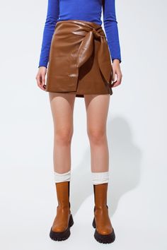 Q2 Brown faux leather mini skirt with bow on the side Brogues Womens, Swimsuit Wrap, Puffer Jacket Men, Mens Lightweight Jacket, Dressy Sandals, Faux Leather Mini Skirt, Trendy Chic, Brown Skirts, Denim Jacket Men