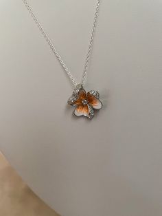 *Material: 925 sterling silver chain, rhodium plated, 31 CZ stones *Length: 18in *Color: orange and white White Cubic Zirconia Flower Necklace, White Cubic Zirconia Flower-shaped Necklaces, White Cubic Zirconia Necklaces With Flower Shape, White Cubic Zirconia Necklace In Flower Shape, White Cubic Zirconia Floral Necklace, White Sterling Silver Flower Necklace, Hawaiian Flower, Cz Necklace, Hawaiian Flowers