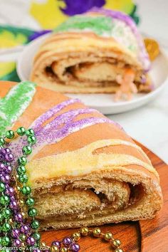 there is a mardi gras roll with beads on it