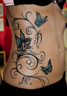 a woman's stomach with butterflies on it