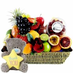 a basket filled with lots of different types of fruit