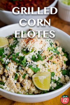 a white bowl filled with rice and topped with cilantro, parsley and lime