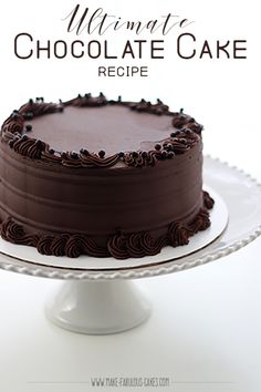 a chocolate cake sitting on top of a white cake plate with the words, homemade chocolate cake recipe