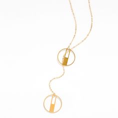 Art Deco-inspired adjustable lariat necklace featuring 2 small round pendants on a long, gold-filled cable chain. This 30" (72 cm) necklace does not have a clasp, as it is wide enough to fit around your head and can be adjusted to the desired position by gently sliding the pendants up or down.- Pendants: gold plated brass- Chain is 30" long (72 cm)- Chain: 14K gold filled or sterling silver- Dimensions: pendants measure approximately 0.8" x 0.8" (20 mm x 20mm) Pendants Gold, Art Deco Inspired, Lariat Necklace, Round Pendant, Juno, Brass Chain, Your Head, Cable Chain, Gold Filled