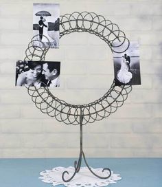 a wedding cake topper with photos on it