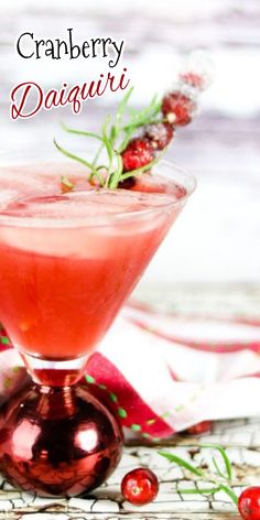 the cranberry daiquita is garnished with rosemary