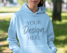 Enhance your apparel designs and showcase them in a professional and realistic manner with our mockups. Whether you're a designer, entrepreneur, or simply looking to visualize your creative ideas, our mockups are the perfect tool to bring your designs to life. This mockup features a Light Blue Gildan 18500 unisex heavy blend hooded sweatshirt. You will receive 1 high-resolution image, ensuring every detail of your design is beautifully displayed. Please note that this is a digital product, and n Blue Customizable Hoodie, Customizable Blue Hoodie With Long Sleeves, Customizable Blue Long Sleeve Hoodie, Customizable Long Sleeve Blue Hoodie, Customizable Blue Casual Hoodie, Sweatshirt Model, Hoodie Mockup, Gildan Hoodie, 1 Image