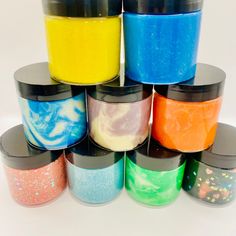 there are many different colors of powder in the containers