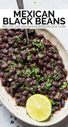 mexican black beans in a white bowl with a lime slice on the side and text overlay