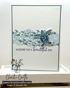 a close up of a card with a sea turtle on the bottom and words saying wishing you a beautiful day