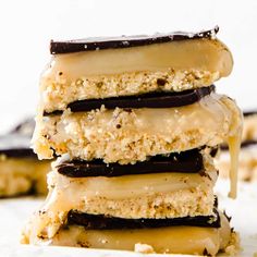 a stack of ice cream sandwiches on top of each other with chocolate and peanut butter