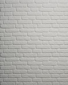 a white brick wall is shown with no mortar