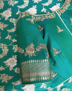 A closer look at the timeless amalgamation of shades of green, silver and gold, made exquisite with zari, crystals, and silk thread elements. Saree from @reshamweave Get yours done. DM : @rajeedesignstudio Contact : +91 8884422996 Location : 5th Block, Jayanagar #workblouse #workblouses #sareeblousedesigns #sareeblouse #silksarees #silksareesonline #silksareeblousedesigns #bridalsarees #weddingsaree #kanchipuramsaree #muhurthamsarees #pattusaree #patternblouse #blousepattern #aariworkbl... Silk Saree Blouse Designs, Kanchipuram Saree, Blouse Work, Silk Sarees Online, Blouse Work Designs, Bridal Saree, Silk Thread, Saree Blouse Designs, Blouse Patterns