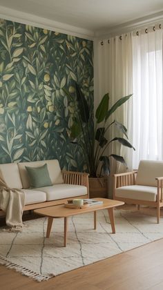 a living room filled with furniture and a large wallpapered plant behind the couch