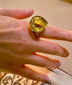 Large Citrine Modernist Brutalist ring!  Reverse carved rose cut Citrine is eye clean, pastel yellow and huge and approx 34Ct ! it is carved on the other side and rose cut! it is bezel set and well built/thick Modernist/Brutalist ring! crafted in solid sterling silver with 14k yellow gold wash. size approx 8.75USA  and we can size. or we can include a free sizer you can attach any time you wish. marked 925 and fully tested. in excellent shiny clean as new condition! no wear to the stone - fabulouse rose cut stone!! looks like solid yellow gold designer ring which would cost over 2-3K.  citrine is a birthstone for scorpio and considered a wealth stone and great for chakras healing. looks even more beautiful in person!  smoke free environment and fast insured shipping! comes in a ring case! Luxury Faceted Yellow Ring, Yellow Rings With Rose Cut Diamonds For Gift, Yellow Rose Cut Diamond Rings For Gift, Luxury Handmade Yellow Rings, Brutalist Ring, Chakras Healing, Yellow Ring, Ring Case, Yellow Rings