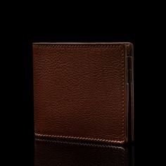 A premium leather men's wallet that combines excellent practicality with timeless elegance, ensuring it never goes out of style, enhanced with RFID-blocking technology to protect your personal and financial data from electronic theft. Handmade from luxurious full-grain, vegetable-tanned Italian "Cuoio Superiore" leather, this wallet is available in elegant black, solid brown, and classic tan, designed for multipurpose everyday use. The Money Clip feature allows quicker and easier access to cash, Luxury Brown Trifold Wallet For Men, Luxury Modern Brown Wallets, Luxury Brown Men's Trifold Wallet, Luxury Brown Rectangular Wallet, Luxury Brown Men's Wallet, Leather Money Clip, Leather Money Clip Wallet, Leather Money Clips, Wallet For Men